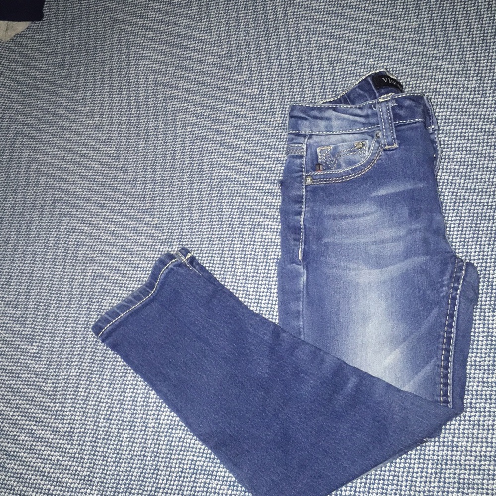 Girls medium wash jeans.